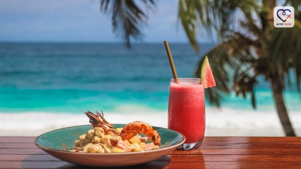 Mâncăruri gastronomice din Seychelles servite pe plajă